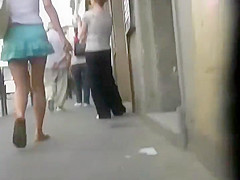 Hot girl in a turqoise short skirt