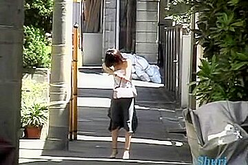 In this asian sharking video a guy pulls of the shirt of a sexy woman