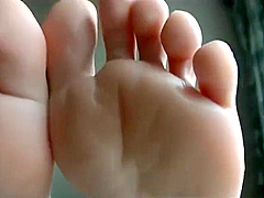 Japanese Removes Stockings To Bare Feet