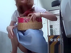 Japanese women expose pussies while peeing in public