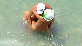 Kama Sutra on the beach Couples have sex in the sea
