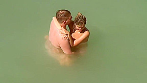 Kama Sutra on the beach Couples have sex in the sea