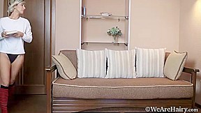 Laima enjoys herself as she masturbates on a sofa - WeAreHairy