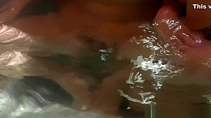 Lesbians in spa fingering and licking