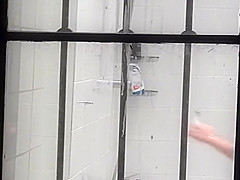 Long haired girl in a public shower