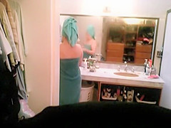 Milf caught after taking shower