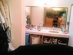 Milf caught after taking shower