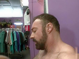 Muscle bear goes to adult shop