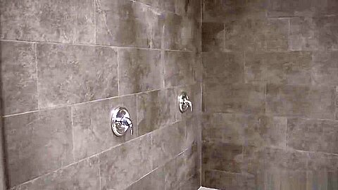 Naked studs tease each other in the shower and ass fuck