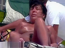 Naked tits proudly sticking for beach cam