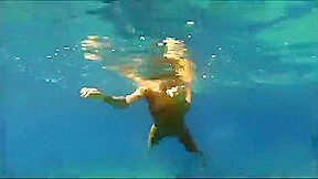 Nastka peeing into the sea