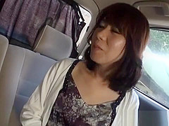 Naughty Japanese Milf Gives Handjob In The Car
