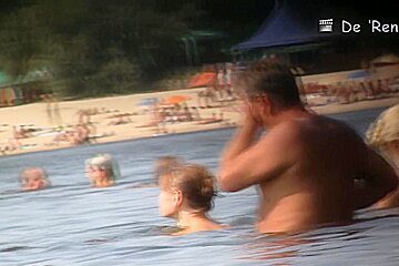 Nude amateur is having entertainment on beach