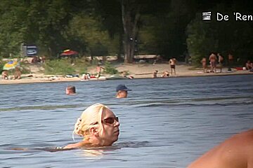 Nude amateur is having entertainment on beach