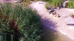 Nude beach sex, video taken by a drone
