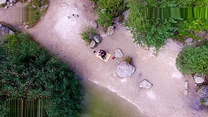 Nude beach sex, video taken by a drone