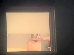 Nude girl spied from the window