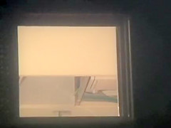 Nude girl spied from the window