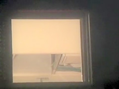 Nude girl spied from the window