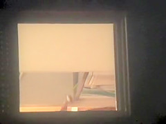 Nude girl spied from the window