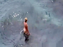 Nudist bathing sea water and blowjob