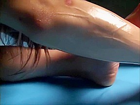 Oiled asian Gymnast Stretching