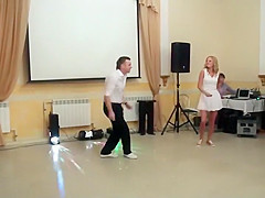 Peeking up her skirt during a dance