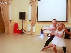 Peeking up her skirt during a dance