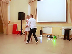 Peeking up her skirt during a dance