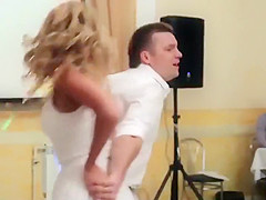 Peeking up her skirt during a dance