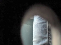 Pretty blonde is smoking and pissing on the toilet