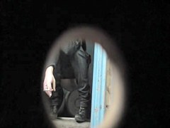 Pretty blonde is smoking and pissing on the toilet