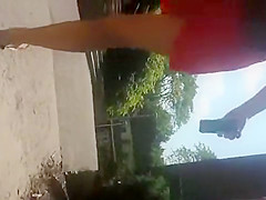 Public upskirt tease with cutie in a short dress