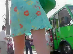 Pussy slip under milf's skirt