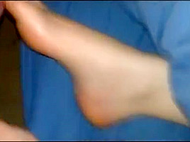 Rubbing her soles (cum)