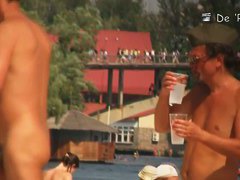 Semi nude, semi-regular beach with naked and dressed people