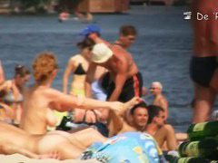 Semi nude, semi-regular beach with naked and dressed people