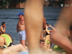 Semi nude, semi-regular beach with naked and dressed people