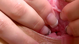 Sensual kitten is gaping narrowed crack in close range and having orgasm