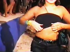 Sexy Latina in jeans flashes tits and ass at outdoor party