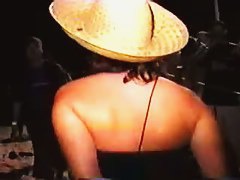 Sexy Latina in jeans flashes tits and ass at outdoor party