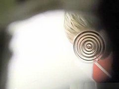 Short hair woman caught pissing in public toilet