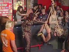 Slaves whipped and fucked in public bar