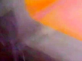 Slut puts lit candle and dildo in girl's cunt