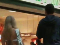 Slutty blonde in tight pants stars in a hot candid street vid