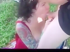 Tatooed Slut Jerking Off Several Guys In The Woods