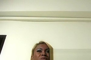 Thin long haired blonde ladyboy enjoys stroking and cumming