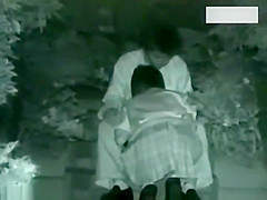 Two couples making love outside