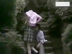 Two couples making love outside