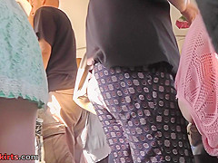 Upskirt vid made in public shows redhead in g-string